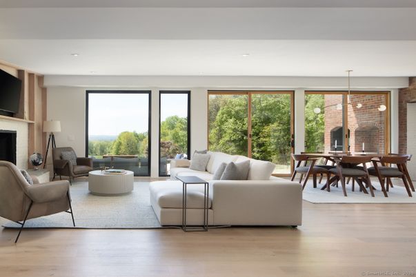 Dining room, Fireplace, Interior, Living room, Pendant Lights, Recessed Lighting, Wood Texture Flooring