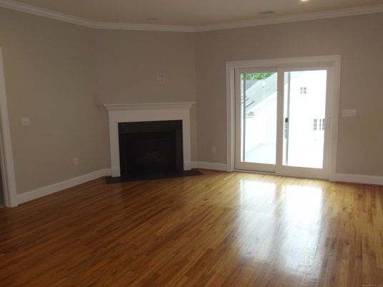 Empty room, Fireplace, Interior, Recessed Lighting, Wood Texture Flooring