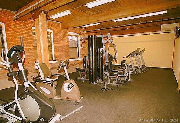 Fitness Equipment, Gym, Interior, Stone Walls, Wooden Beams