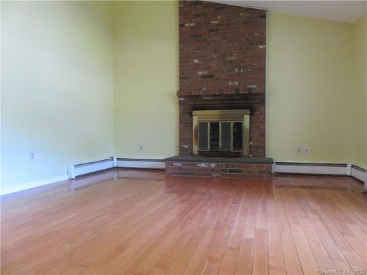 Empty room, Fireplace, Interior, Stone Walls, Wood Texture Flooring