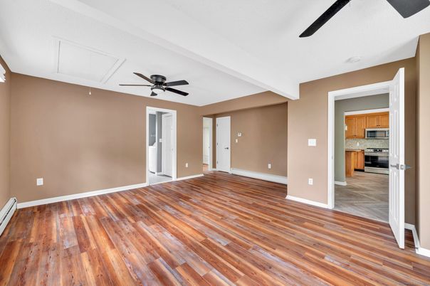Empty room, Interior, Kitchen, Stainless Steel Appliances, Wood Texture Flooring