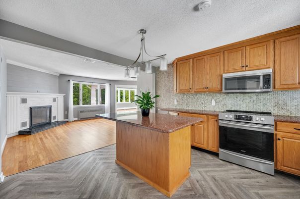 Fireplace, Interior, Kitchen, Pendant Lights, Stainless Steel Appliances, Wood Texture Flooring