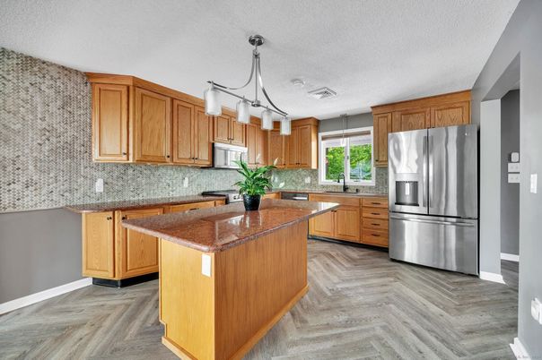Chandelier, Interior, Kitchen, Pendant Lights, Stainless Steel Appliances, Wood Texture Flooring