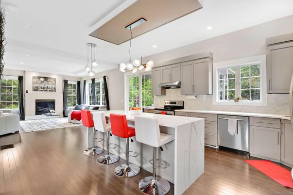 Fireplace, Interior, Kitchen, Living room, Pendant Lights, Recessed Lighting, Stainless Steel Appliances, Wood Texture Flooring