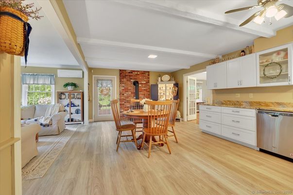 Dining room, Interior, Kitchen, Living room, Recessed Lighting, Stone Walls, Wood Texture Flooring