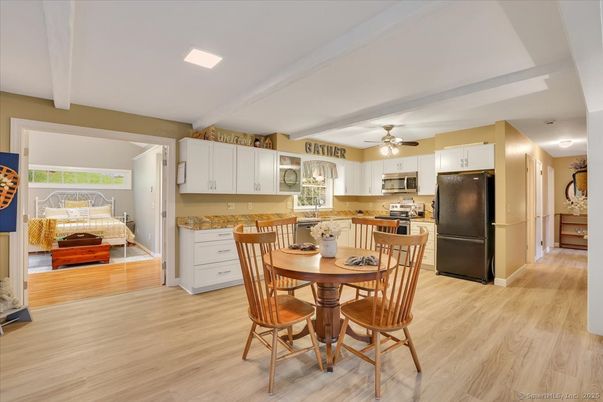 Dining room, Interior, Kitchen, Recessed Lighting, Stainless Steel Appliances, Wood Texture Flooring
