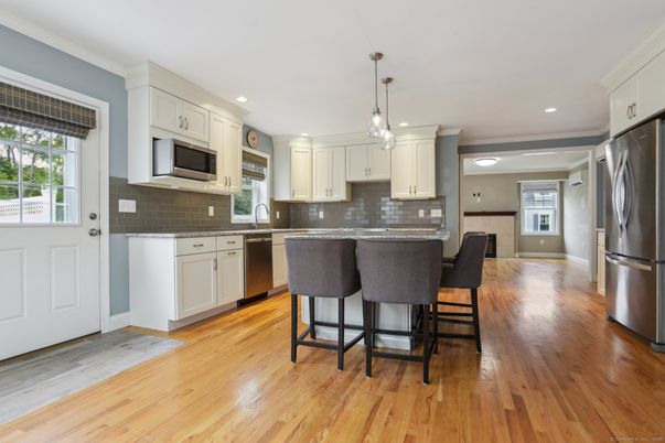 Interior, Kitchen, Pendant Lights, Recessed Lighting, Stainless Steel Appliances, Wood Texture Flooring