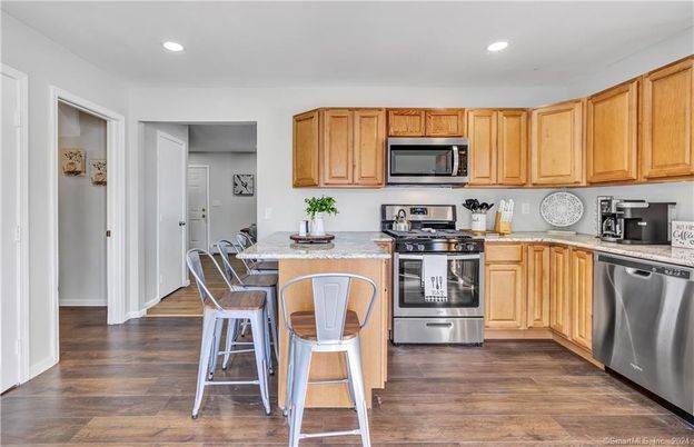 Dining room, Interior, Kitchen, Recessed Lighting, Stainless Steel Appliances, Wood Texture Flooring