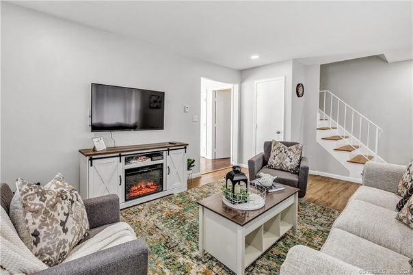 Fireplace, Interior, Living room, Recessed Lighting, Wood Texture Flooring