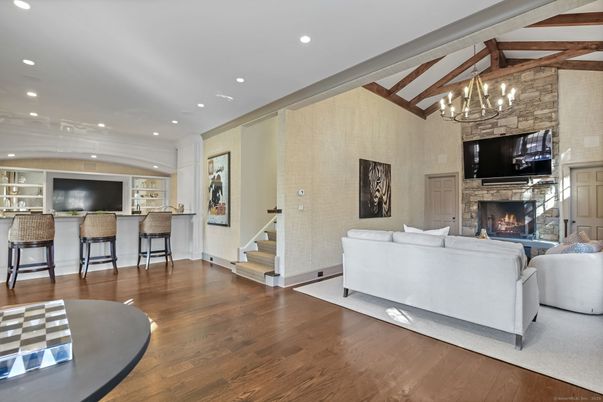 Chandelier, Fireplace, Interior, Living room, Recessed Lighting, Wood Texture Flooring