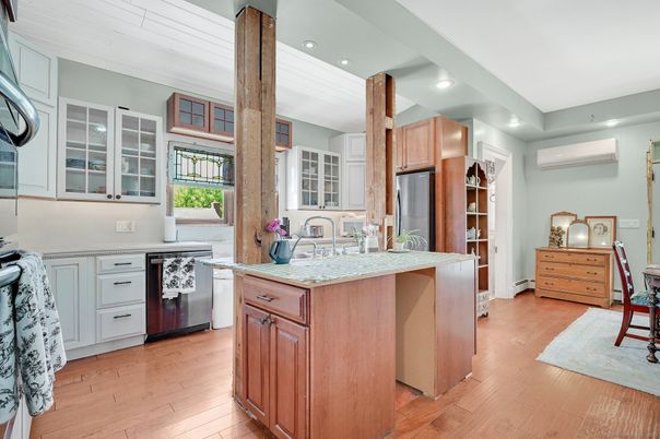 Interior, Kitchen, Recessed Lighting, Tile Countertops, Wood Texture Flooring