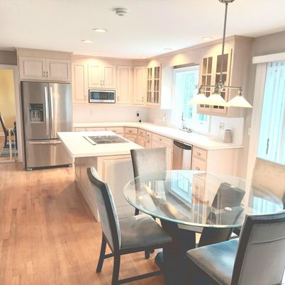 Dining room, Interior, Kitchen, Pendant Lights, Recessed Lighting, Stainless Steel Appliances, Wood Texture Flooring
