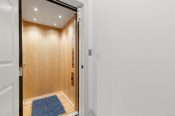 Elevator, Interior, Recessed Lighting, Wooden Walls