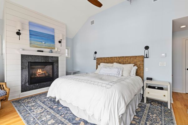 Bedroom, Fireplace, Interior, Recessed Lighting, Wood Texture Flooring
