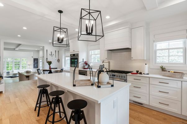 Dining room, Interior, Kitchen, Pendant Lights, Recessed Lighting, Stainless Steel Appliances, Wood Texture Flooring