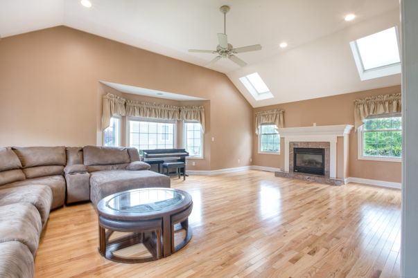 Fireplace, Interior, Living room, Piano, Recessed Lighting, Wood Texture Flooring