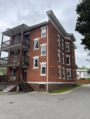 Exterior, Facade, Brick Facade, Condo Building