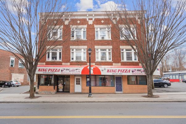 Exterior, Facade, Brick Facade, Condo Building