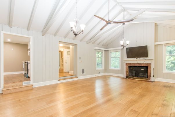 Chandelier, Empty room, Fireplace, Interior, Pendant Lights, Wood Texture Flooring