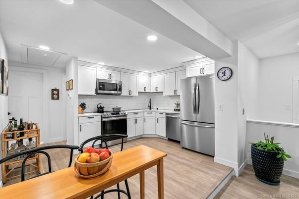 Interior, Kitchen, Recessed Lighting, Stainless Steel Appliances, Wood Texture Flooring