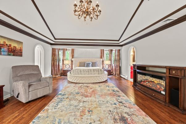 Bedroom, Chandelier, Fireplace, Interior, Wood Texture Flooring