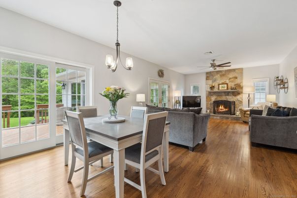 Dining room, Fireplace, Interior, Living room, Pendant Lights, Stone Walls, Wood Texture Flooring