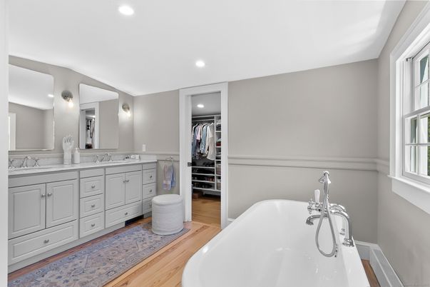 Bathroom, Dual Sink Vanities, Free Standing Baths, Interior, Recessed Lighting, Walk-in Closets, Wood Texture Flooring