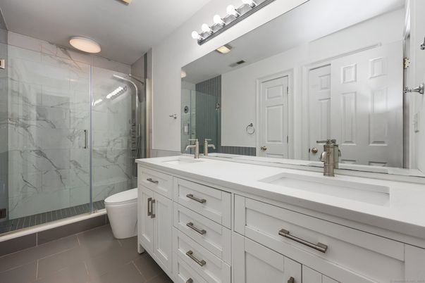 Bathroom, Dual Sink Vanities, Glass Shower, Interior, Marble Walls
