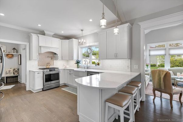 Chandelier, Interior, Kitchen, Pendant Lights, Recessed Lighting, Stainless Steel Appliances, Wood Texture Flooring