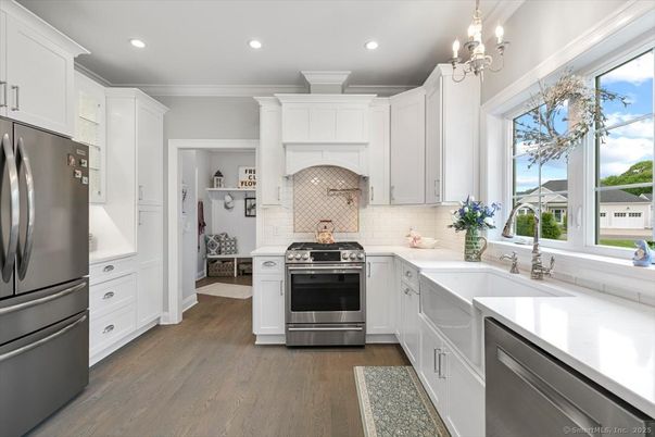 Chandelier, Interior, Kitchen, Recessed Lighting, Stainless Steel Appliances, Wood Texture Flooring