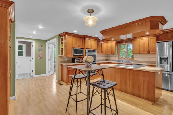 Interior, Kitchen, Recessed Lighting, Stainless Steel Appliances, Tile Countertops, Wood Texture Flooring