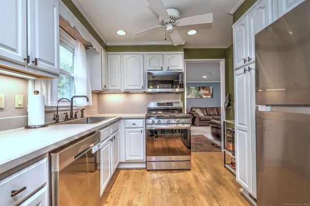 Interior, Kitchen, Recessed Lighting, Stainless Steel Appliances, Wood Texture Flooring