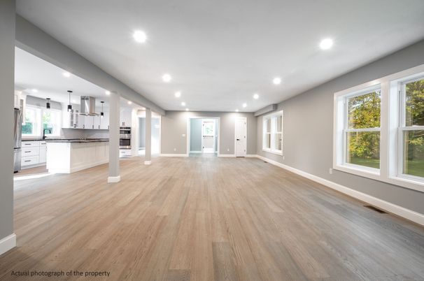 Empty room, Interior, Kitchen, Pendant Lights, Recessed Lighting, Stainless Steel Appliances, Wood Texture Flooring