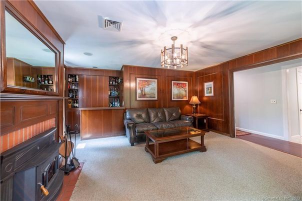 Chandelier, Fireplace, Interior, Living room, Wooden Walls
