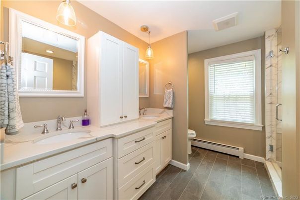 Bathroom, Dual Sink Vanities, Interior, Pendant Lights, Wood Texture Flooring
