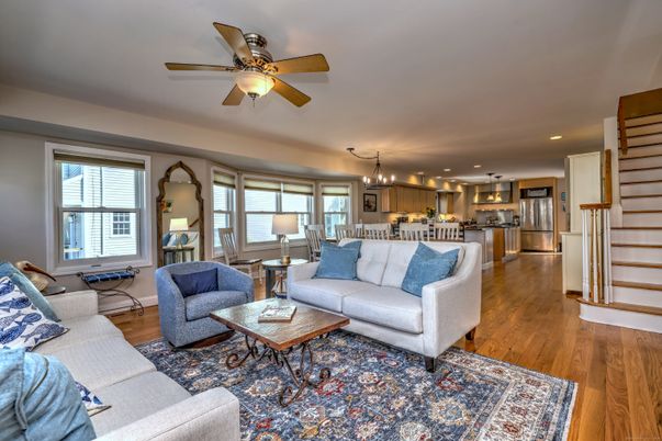 Chandelier, Dining room, Interior, Kitchen, Living room, Pendant Lights, Recessed Lighting, Stainless Steel Appliances, Wood Texture Flooring