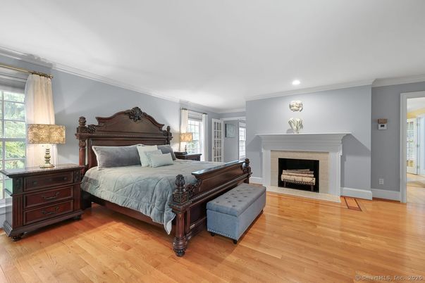 Bedroom, Fireplace, Interior, Recessed Lighting, Wood Texture Flooring