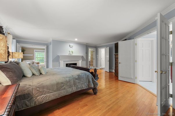 Bedroom, Fireplace, Interior, Recessed Lighting, Wood Texture Flooring