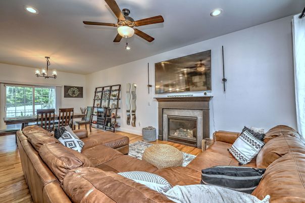 Chandelier, Dining room, Fireplace, Interior, Living room, Recessed Lighting, Wood Texture Flooring