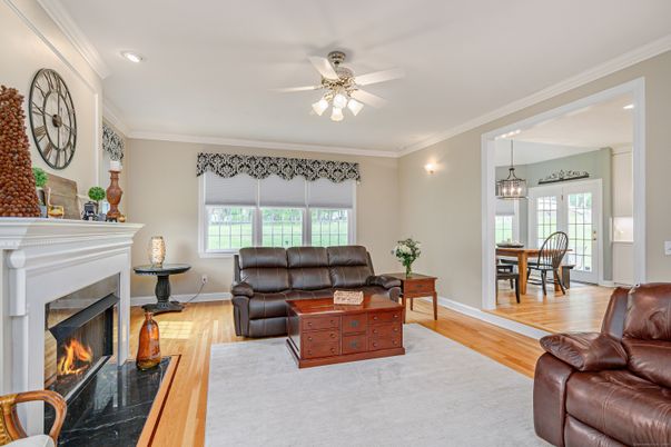 Dining room, Fireplace, Interior, Living room, Pendant Lights, Recessed Lighting, Wood Texture Flooring