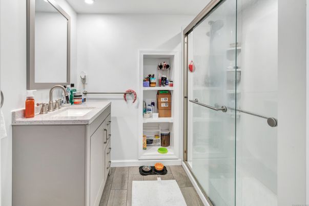 Bathroom, Glass Shower, Interior, Recessed Lighting, Wood Texture Flooring