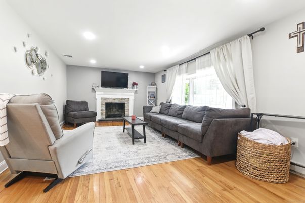 Fireplace, Interior, Living room, Recessed Lighting, Wood Texture Flooring
