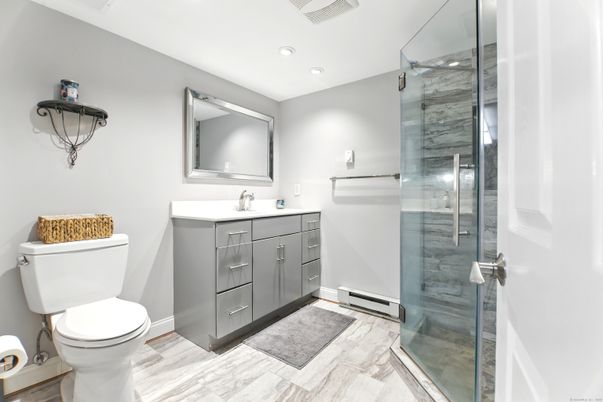 Bathroom, Glass Shower, Interior, Recessed Lighting, Wood Texture Flooring