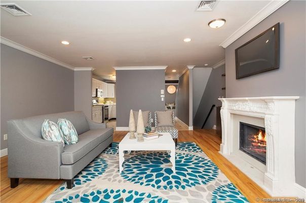 Fireplace, Interior, Living room, Recessed Lighting, Wood Texture Flooring