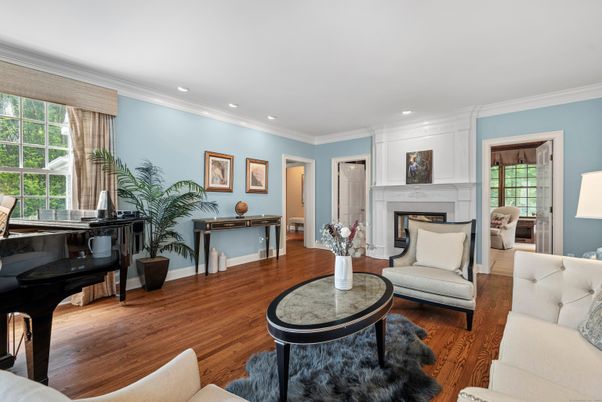 Fireplace, Interior, Living room, Piano, Recessed Lighting, Wood Texture Flooring