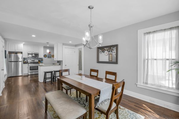 Dining room, Interior, Kitchen, Pendant Lights, Recessed Lighting, Stainless Steel Appliances, Wood Texture Flooring