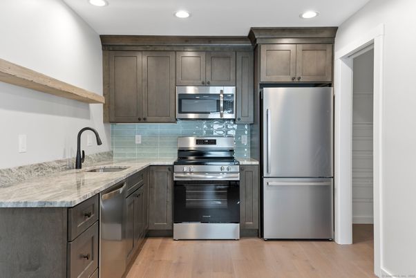 Interior, Kitchen, Recessed Lighting, Stainless Steel Appliances, Wood Texture Flooring