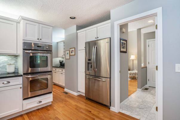 Interior, Kitchen, Marble, Recessed Lighting, Stainless Steel Appliances, Wood Texture Flooring