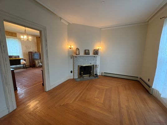 Chandelier, Empty room, Fireplace, Interior, Wood Texture Flooring