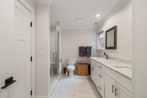 Bathroom, Dual Sink Vanities, Glass Shower, Interior, Marble, Recessed Lighting